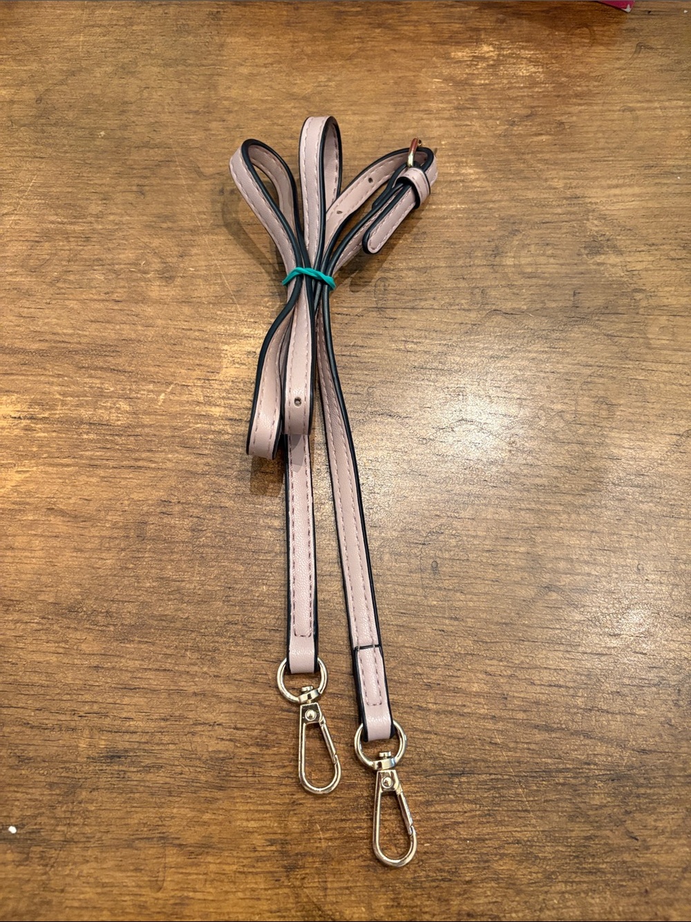 pink leather bag strap